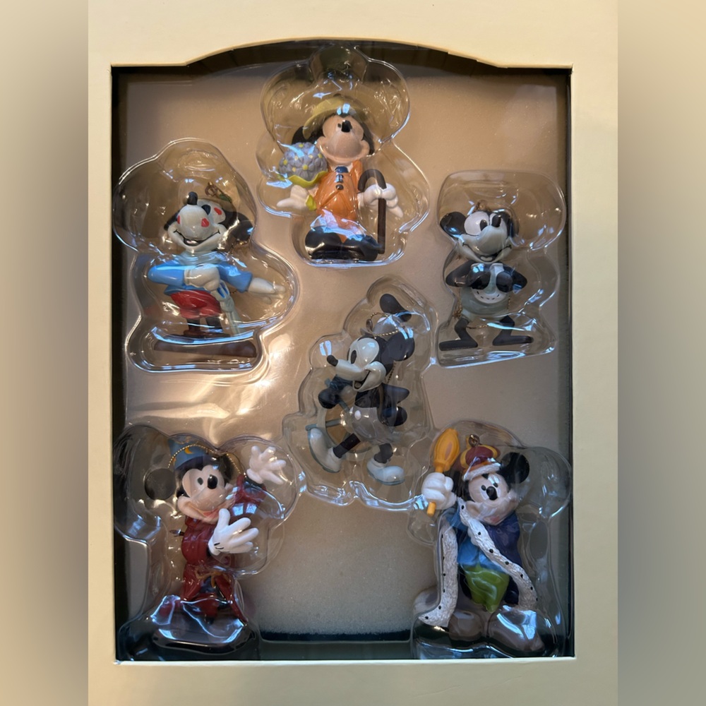 Like new vintage Mickey Through the Years ornament set